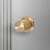 Linear Knurled Fixed Single Sided Door Knob In Brass