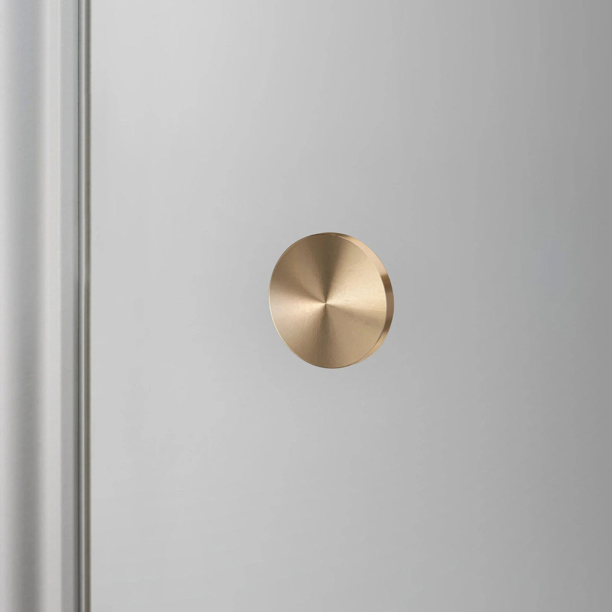 Linear Knurled Fixed Single Sided Door Knob In Brass