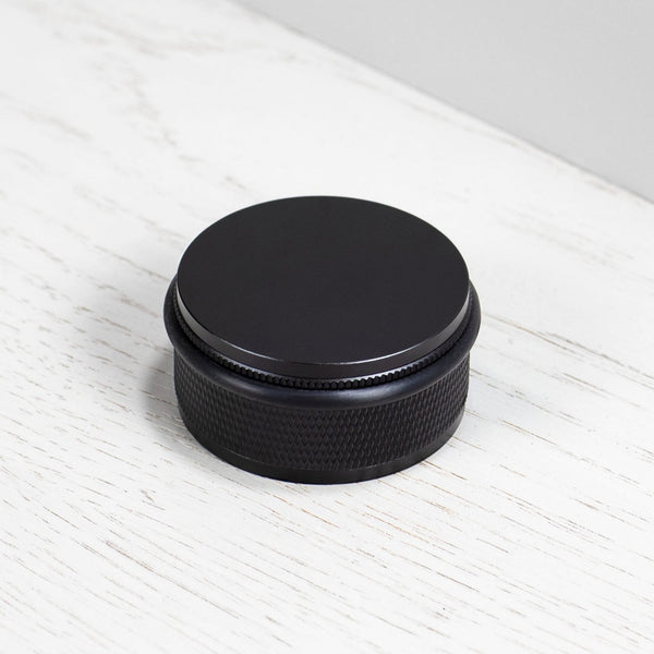 Cross Cut Knurled Door Stop In Black