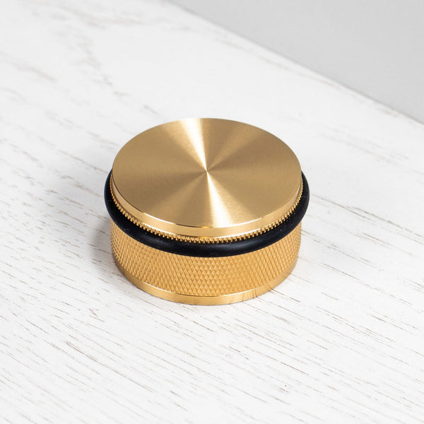 Cross Cut Knurled Door Stop In Brass