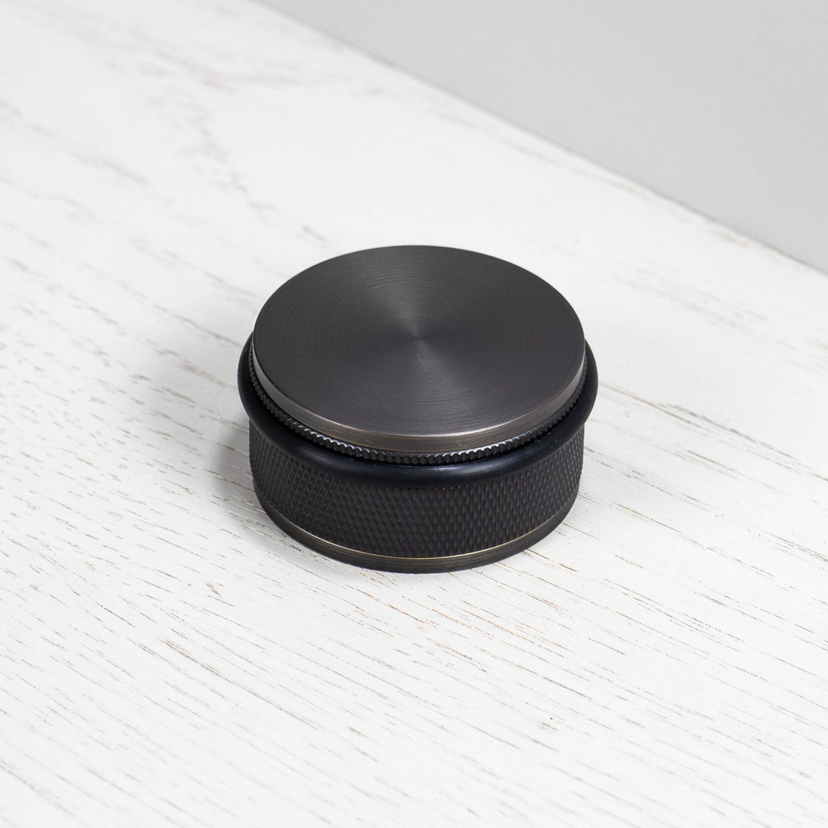 Cross Cut Knurled Door Stop In Smoked Bronze