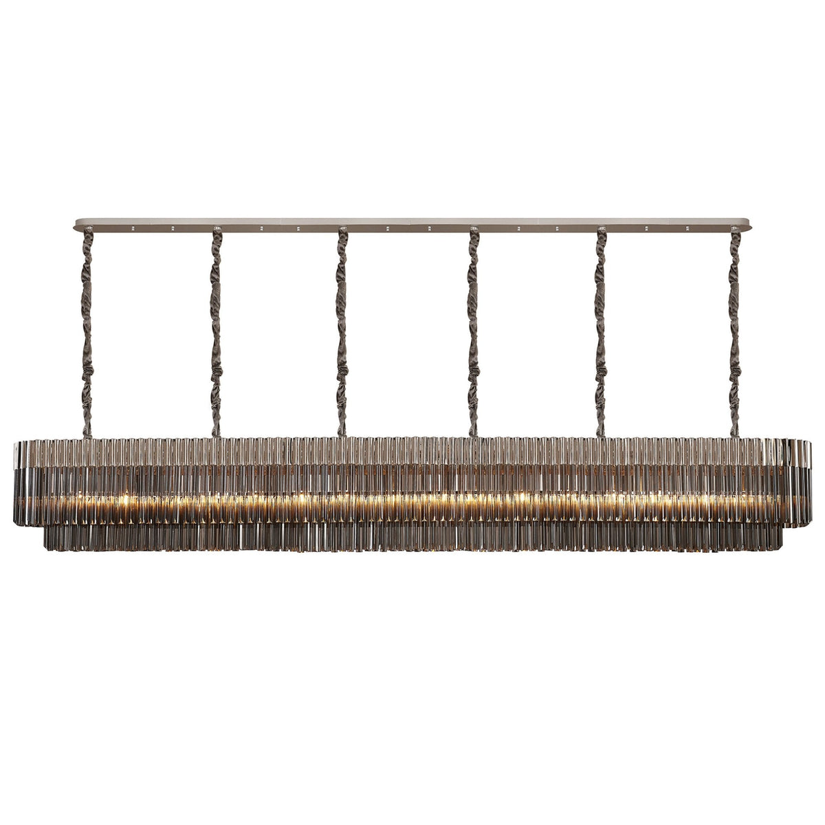 A long, rectangular chandelier with multiple tiers of vertical glass rods, glowing brightly.