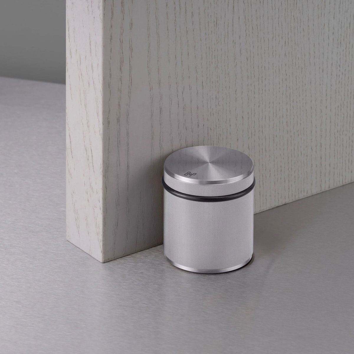 Free Standing Linear Knurled Door Stop In Steel