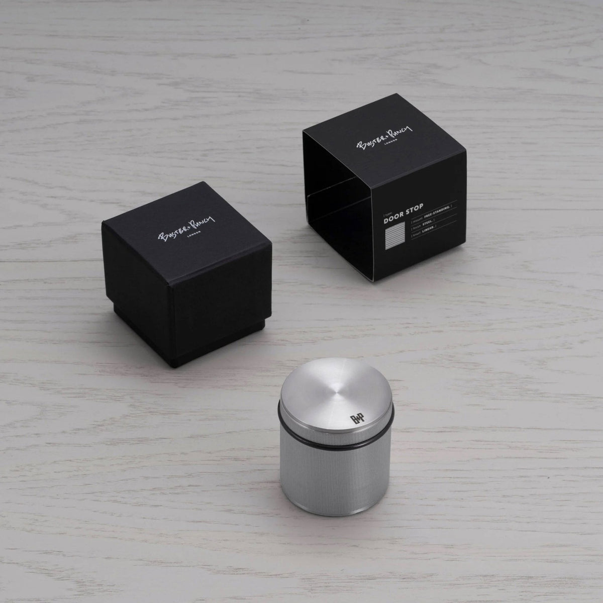 Free Standing Linear Knurled Door Stop In Steel