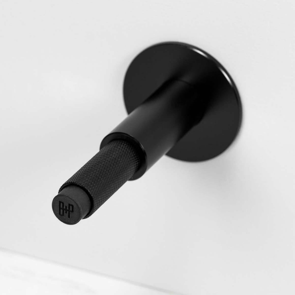Cross Cut Knurled Wall Mounted Door Stop in Black