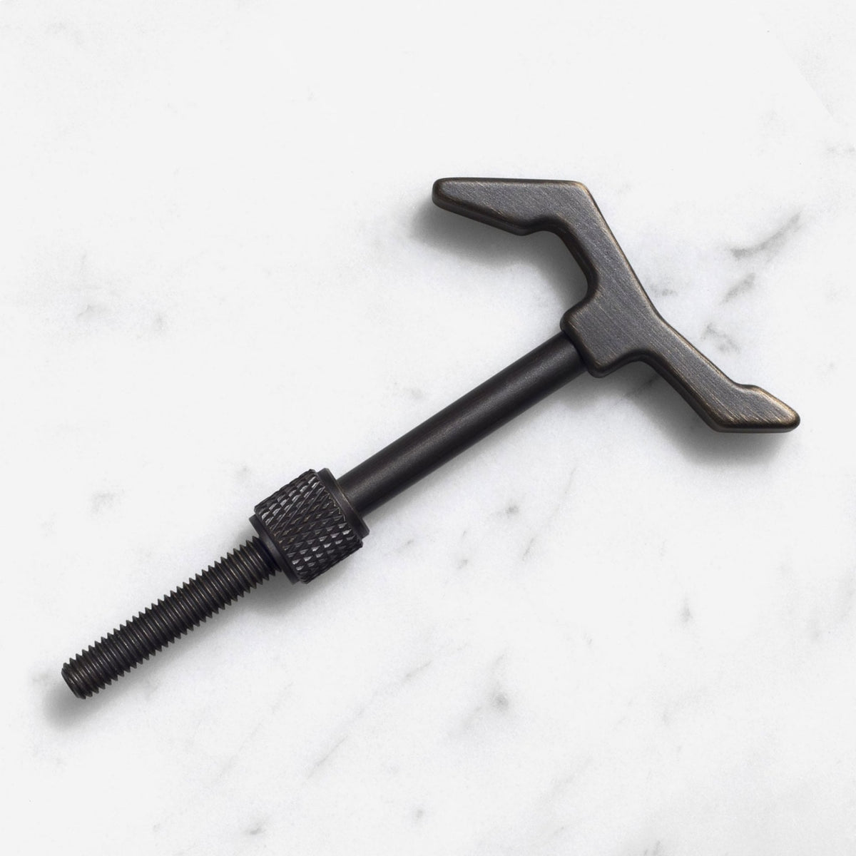 The Hook Cast in Solid Brass with Smoked Bronze Finish