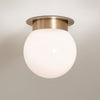 Albers Flush Ceiling Light in Champagne Bronze with Globe Shaped Opal Glass Shade