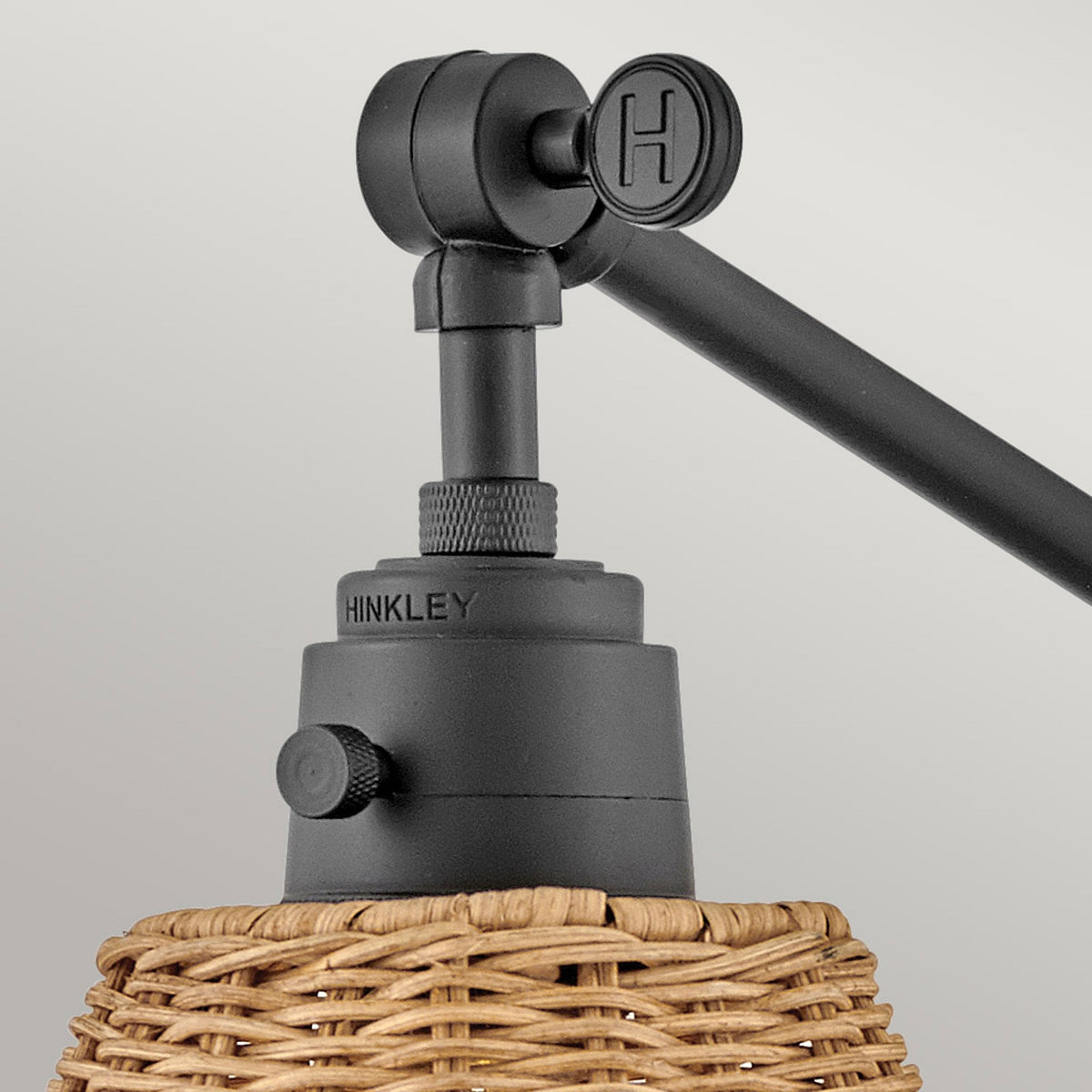 Arti Switched Adjustable Wall Light in Black with Natural Rattan Shade