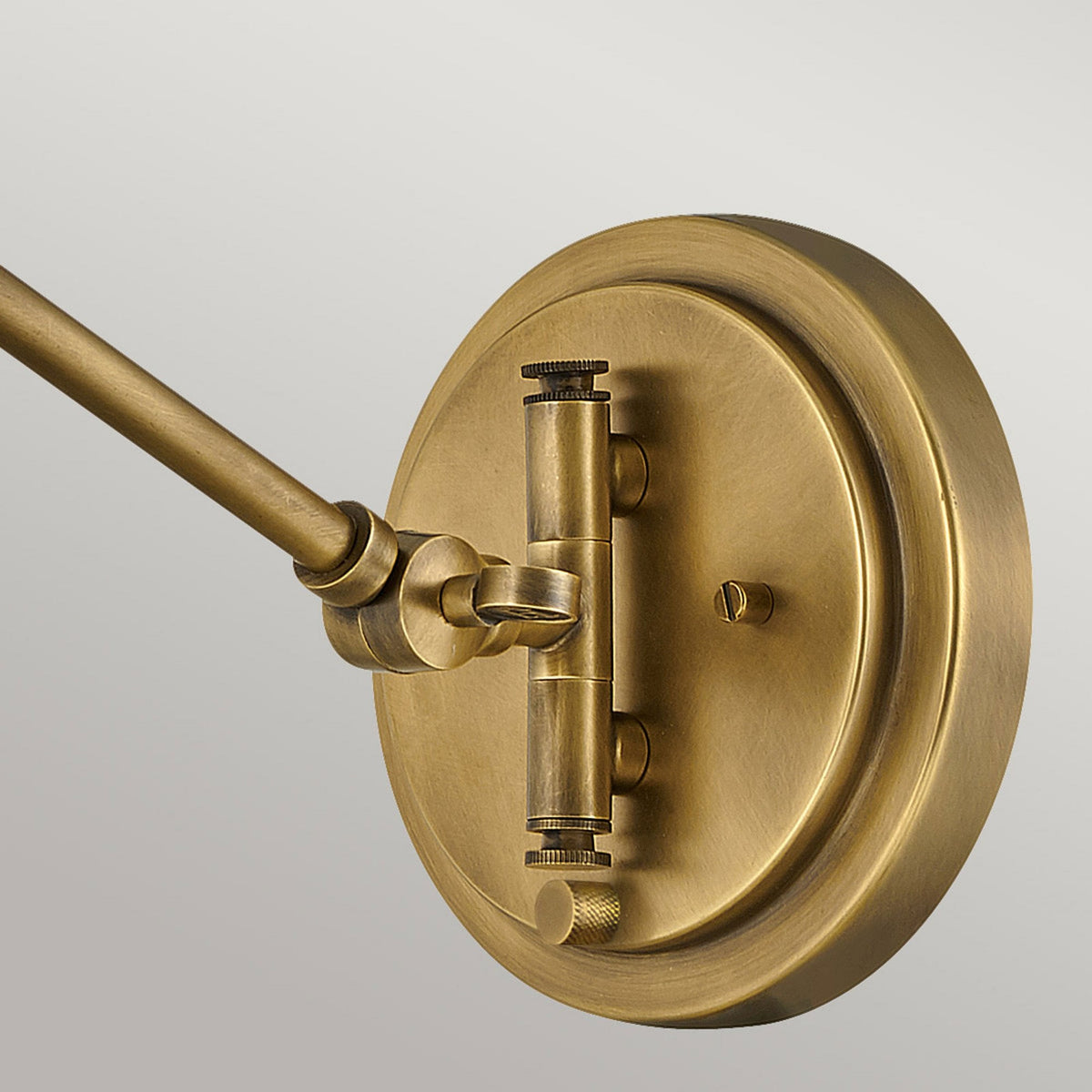 Arti Switched Adjustable Wall Light in Heritage Brass with Clear Glass Shade