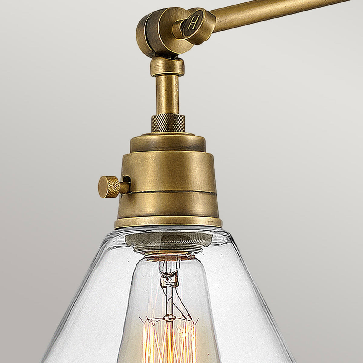 Arti Switched Adjustable Wall Light in Heritage Brass with Clear Glass Shade