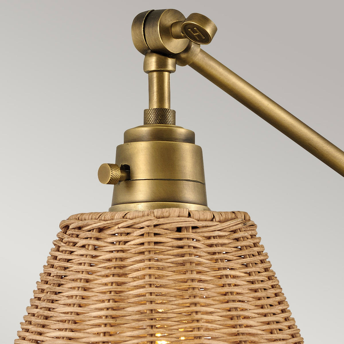 Arti Switched Adjustable Wall Light in Heritage Brass with Natural Rattan Shade