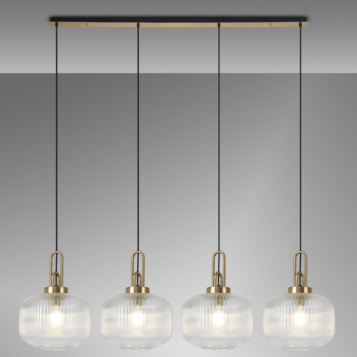 Atherington Pumpkin 4 Drop Linear Pendant in Brass Gold with Clear Shades