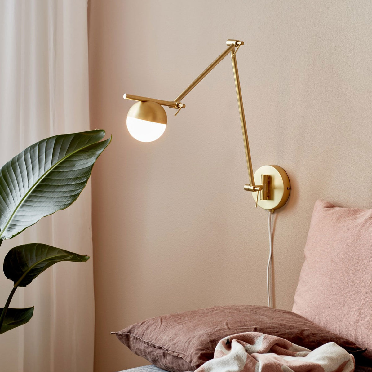 Contina Adjustable Plugged Wall Light in Brass with Opal Glass