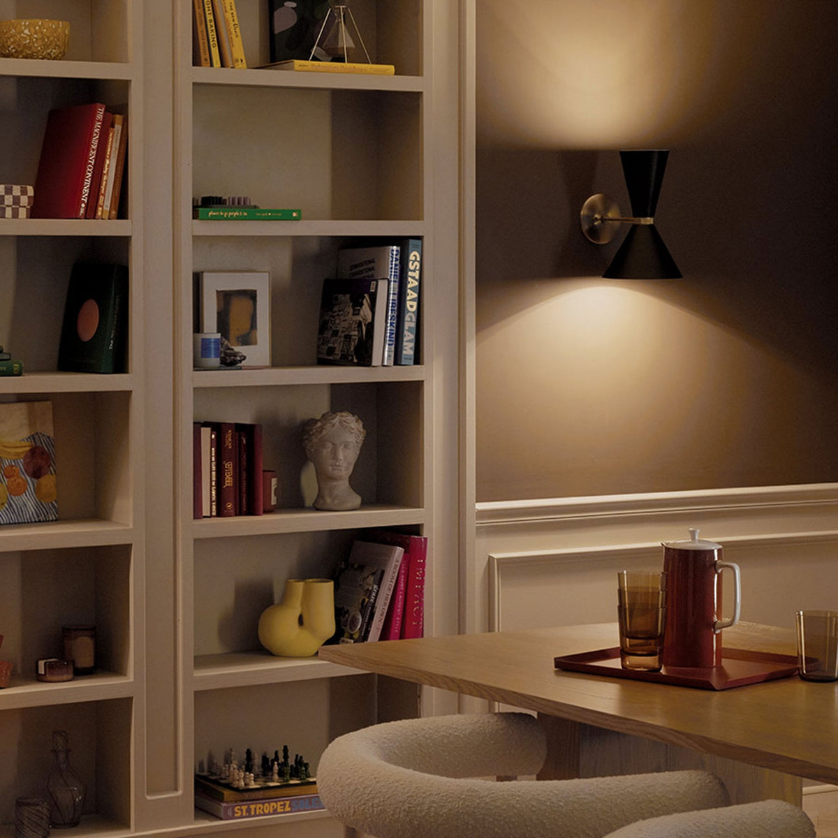 Phix Single Arm Up and Down Wall Light in Black and Champagne Bronze