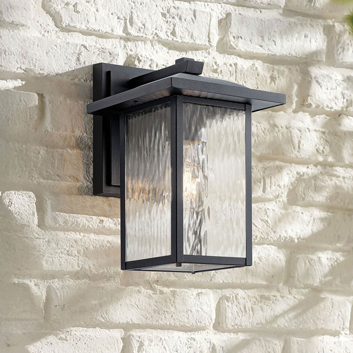 Cappanna IP44 Medium Exterior Wall Light in Textured Black with Clear Water Glass