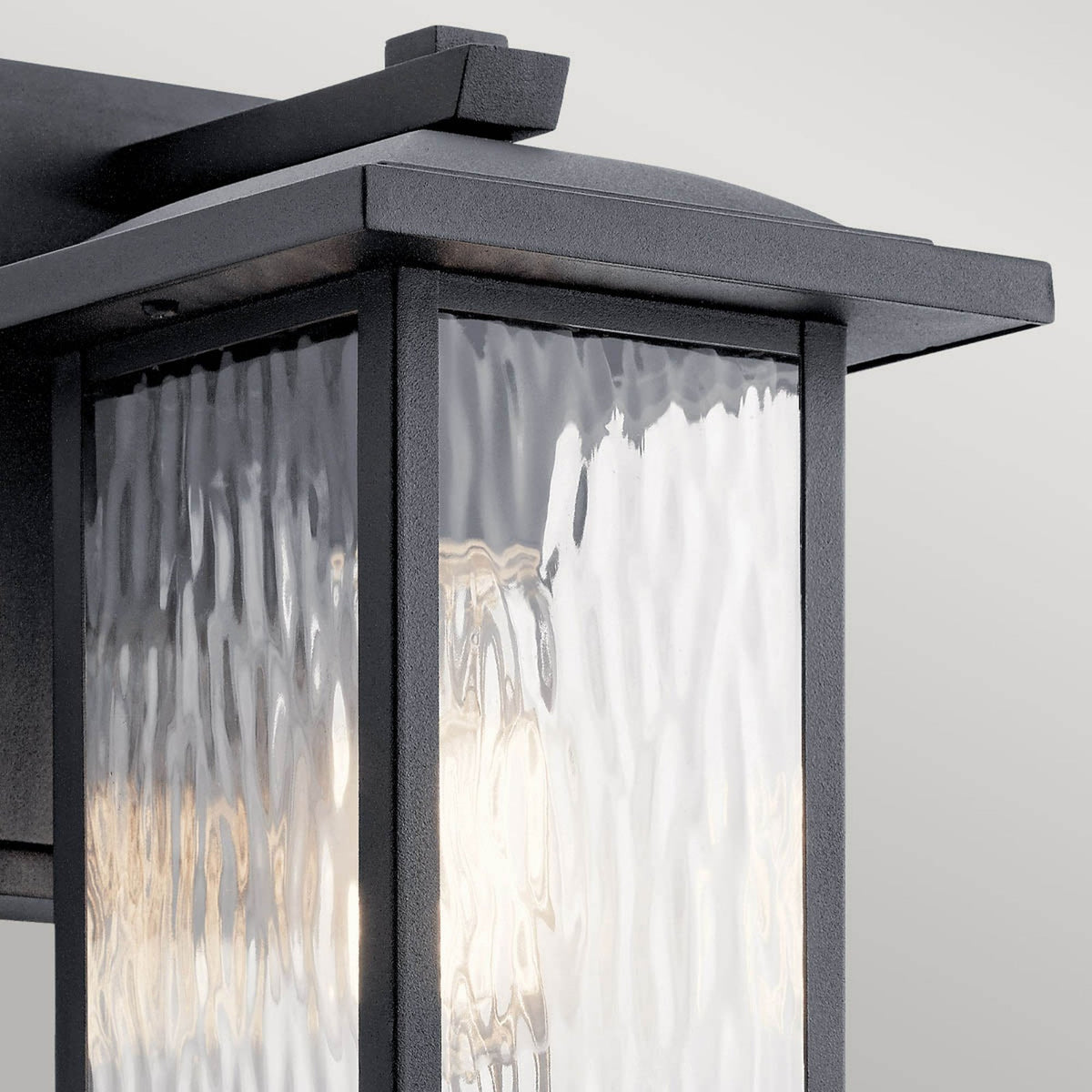 Cappanna IP44 Small Exterior Wall Light in Textured Black with Clear Water Glass