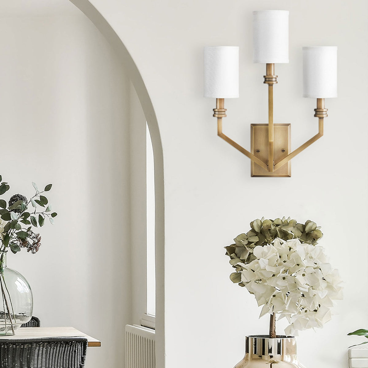 Moore Triple Arm Wall Light in Heritage Brass with Ivory Linen Shades