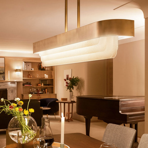 Serene LED Linear Pendant Chandelier in Natural Brass with Layers of Textured Glass