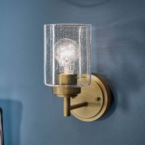 Winslow Single Arm Wall Light in Natural Brass with Clear Seeded Glass