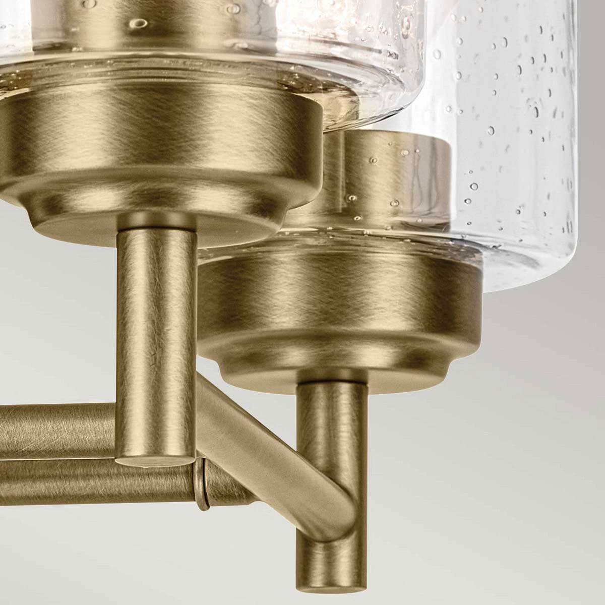 Winslow Twin Arm Wall Light in Natural Brass with Clear Seeded Glass