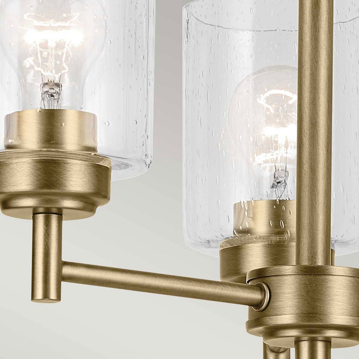 Winslow Three Arm Single Drop Pendant in Natural Brass with Clear Seeded Glass