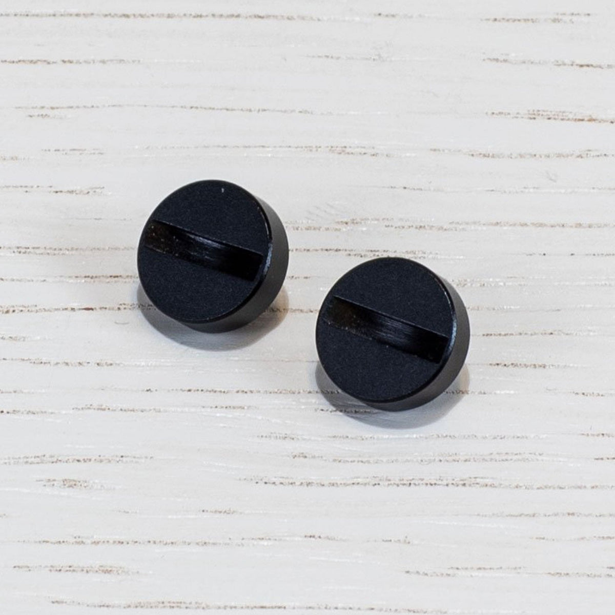 A Pair of Replacement Coin Caps For Switches in Black