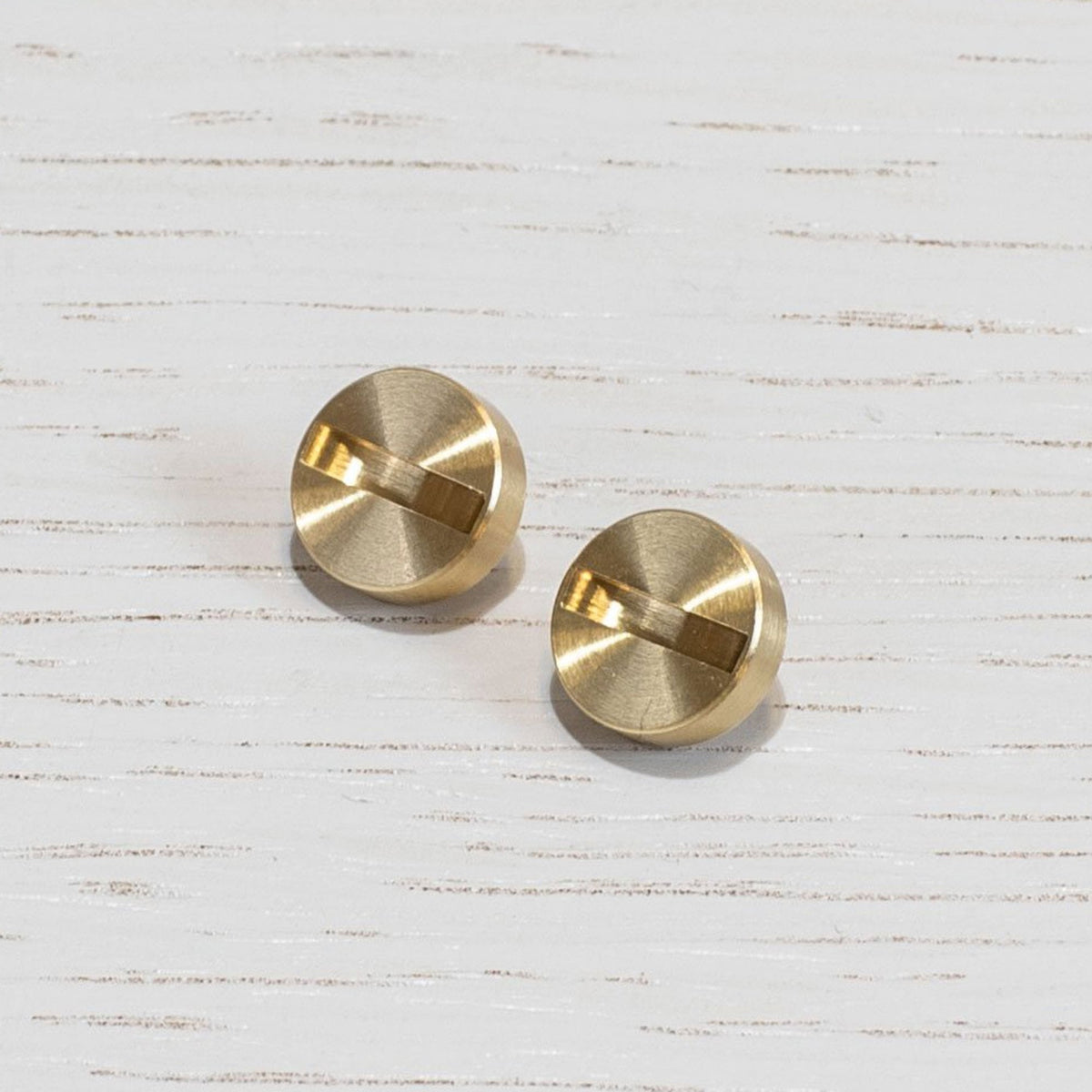 A Pair of Replacement Coin Caps For Switches in Brass