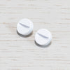 A Pair of Replacement Coin Caps For Switches in White
