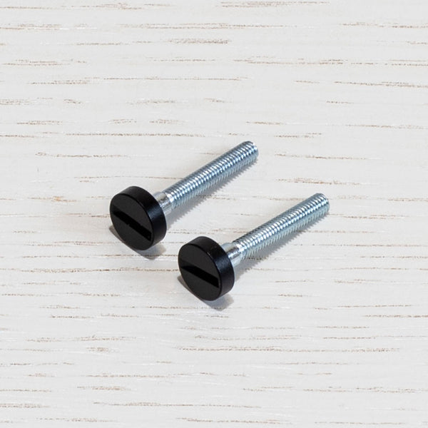 A Pair of Replacement Coin Caps with Screws For Switches in Black