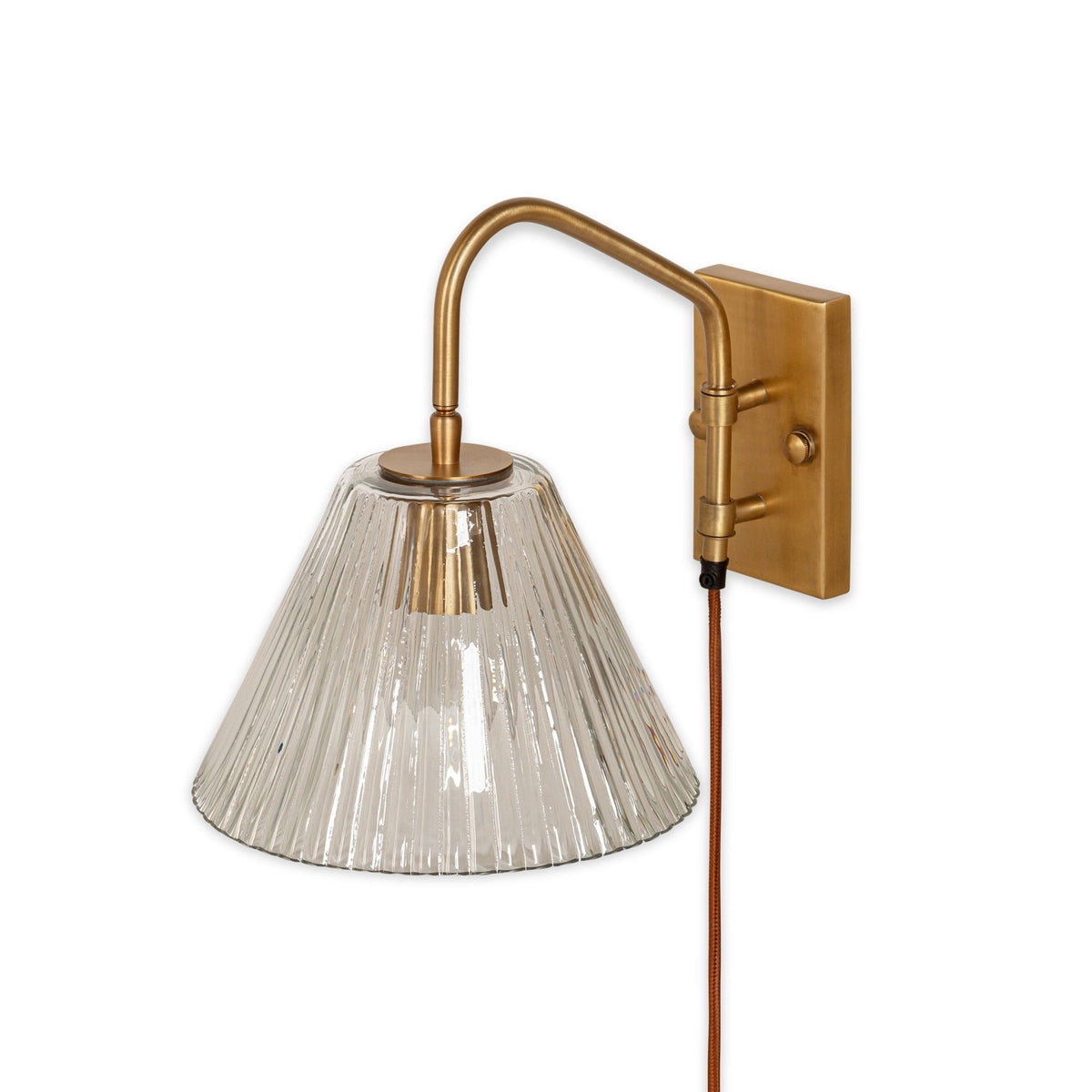 Akoli Plugged Wall Light in Antique Brass With Fluted Glass Shade