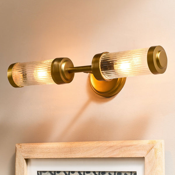 Akurdi IP44 Double Wall Light in Antique Brass With Ribbed Glass Shades