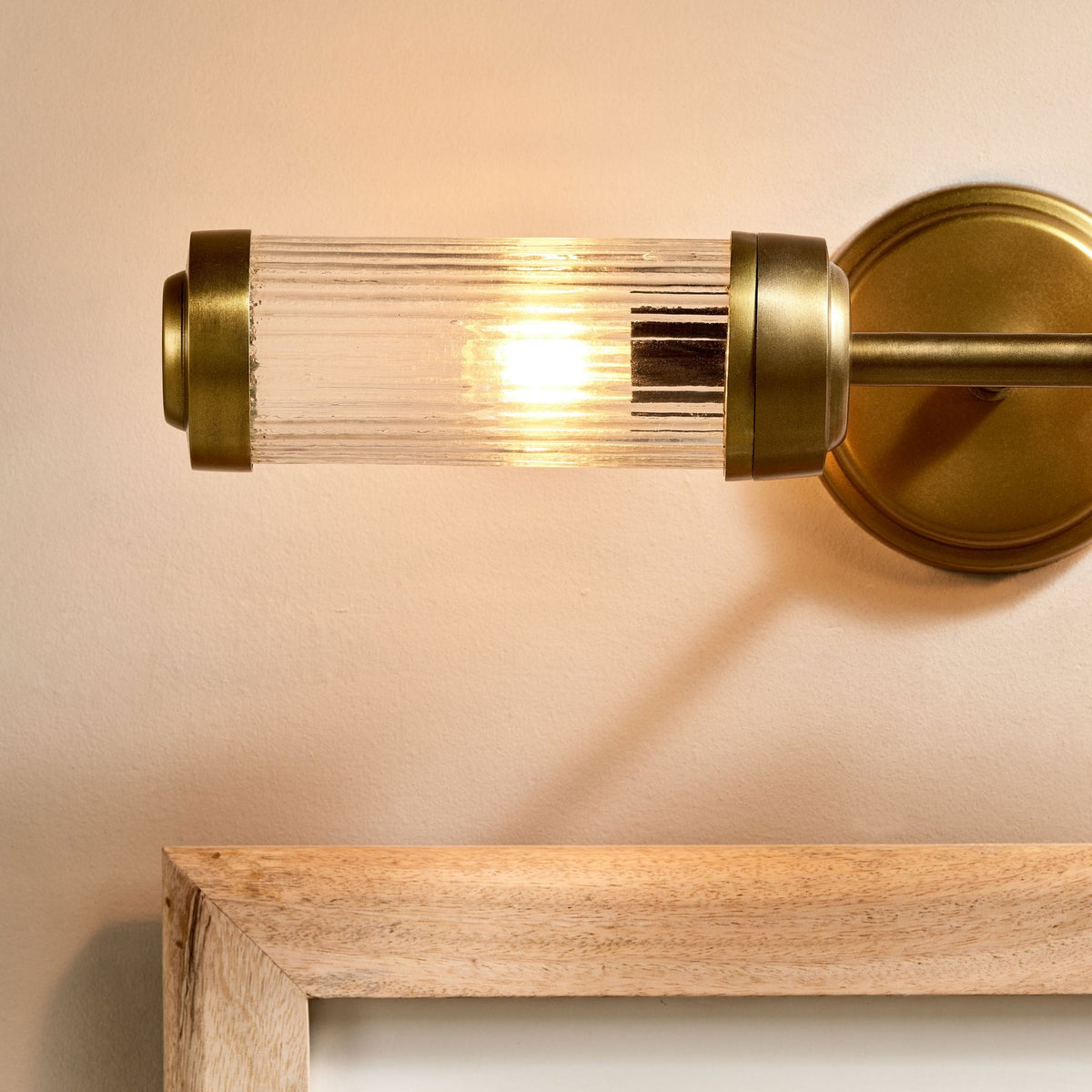 Akurdi IP44 Double Wall Light in Antique Brass With Ribbed Glass Shades