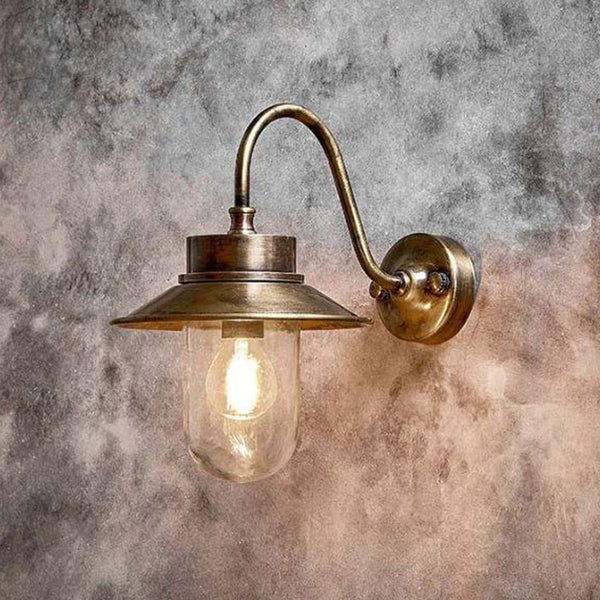 Alwar Outdoor IP44 Wall Light in Antique Brass With Clear Glass Shade