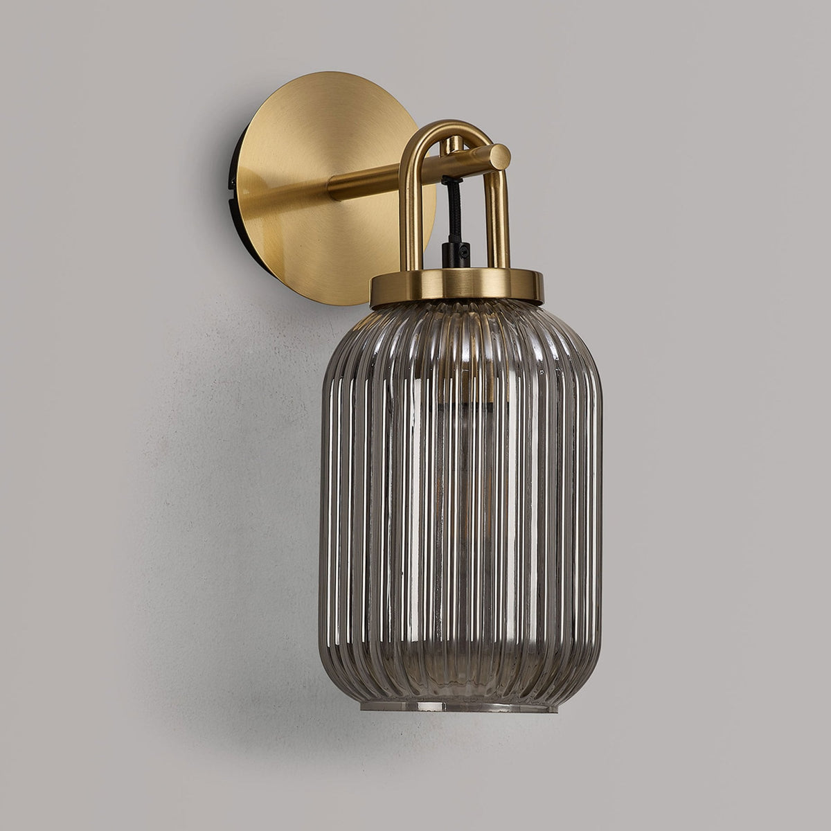 Atherington Wall Light in Brass Gold with Smoked Ribbed Glass Shade
