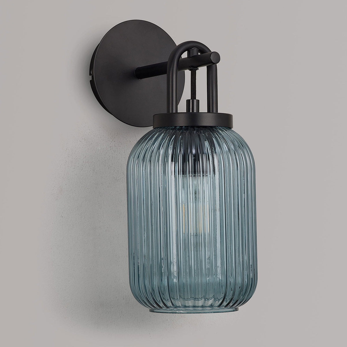 Atherington Wall Light in Matt Black with Petrol Blue Ribbed Glass Shade