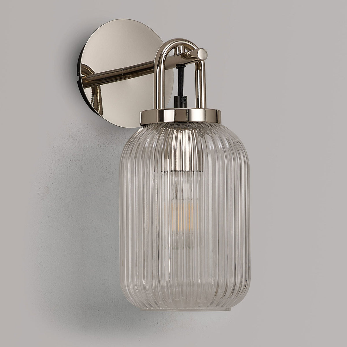Atherington Wall Light in Polished Nickel with Clear Ribbed Glass Shade