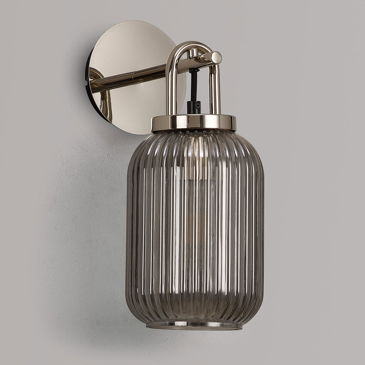 Atherington Wall Light in Polished Nickel with Smoked Ribbed Glass Shade