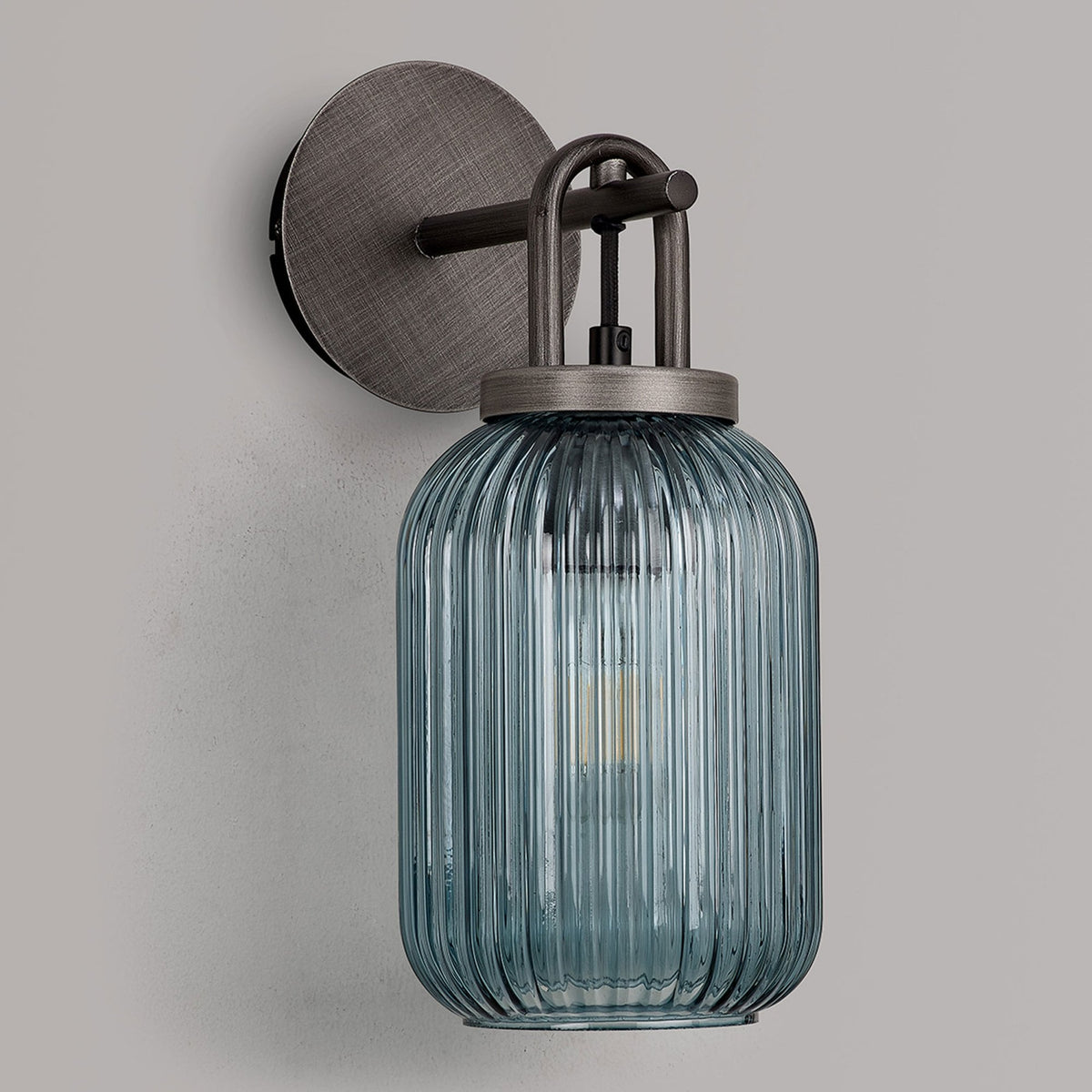 Atherington Wall Light in Aged Pewter with Petrol Blue Ribbed Glass Shade