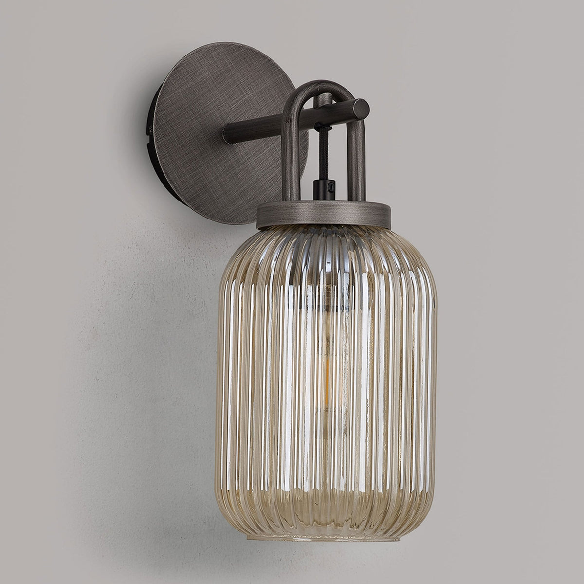 Atherington Wall Light in Aged Pewter with Champagne Ribbed Glass Shade
