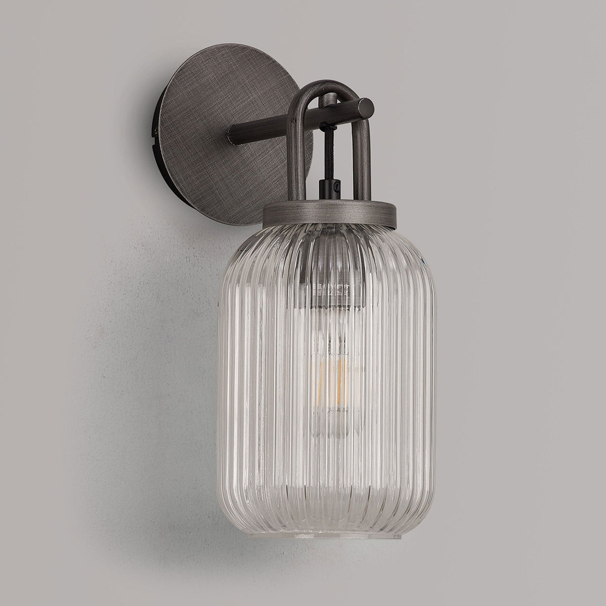 Atherington Wall Light in Aged Pewter with Clear Ribbed Glass Shade