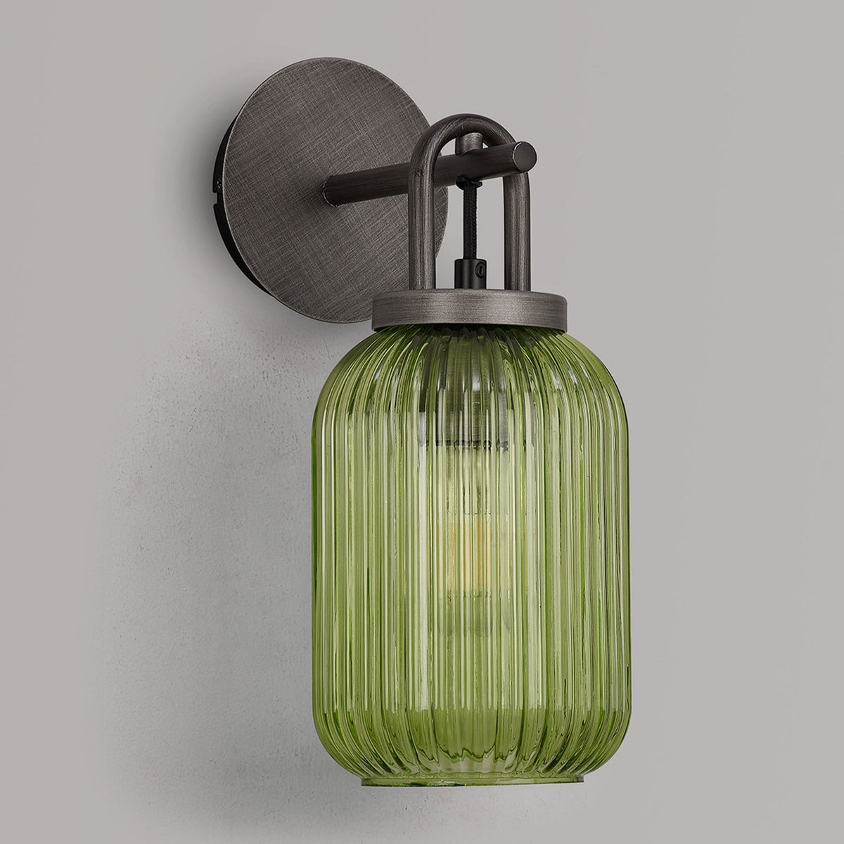 Atherington Wall Light in Aged Pewter with Green Ribbed Glass Shade