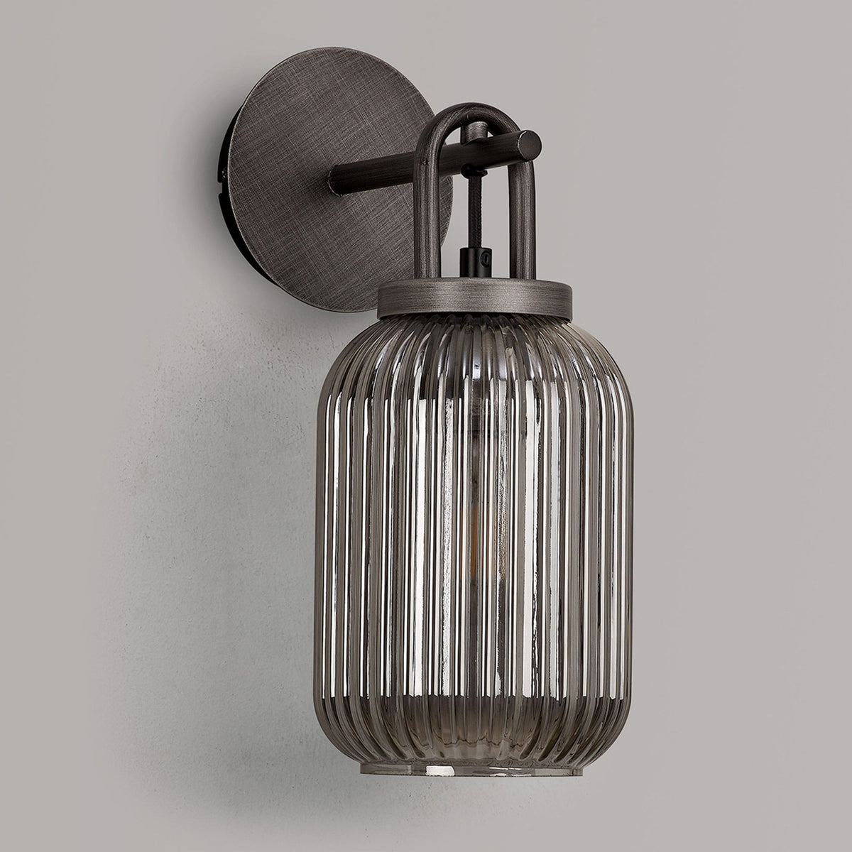 Atherington Wall Light in Aged Pewter with Smoked Ribbed Glass Shade