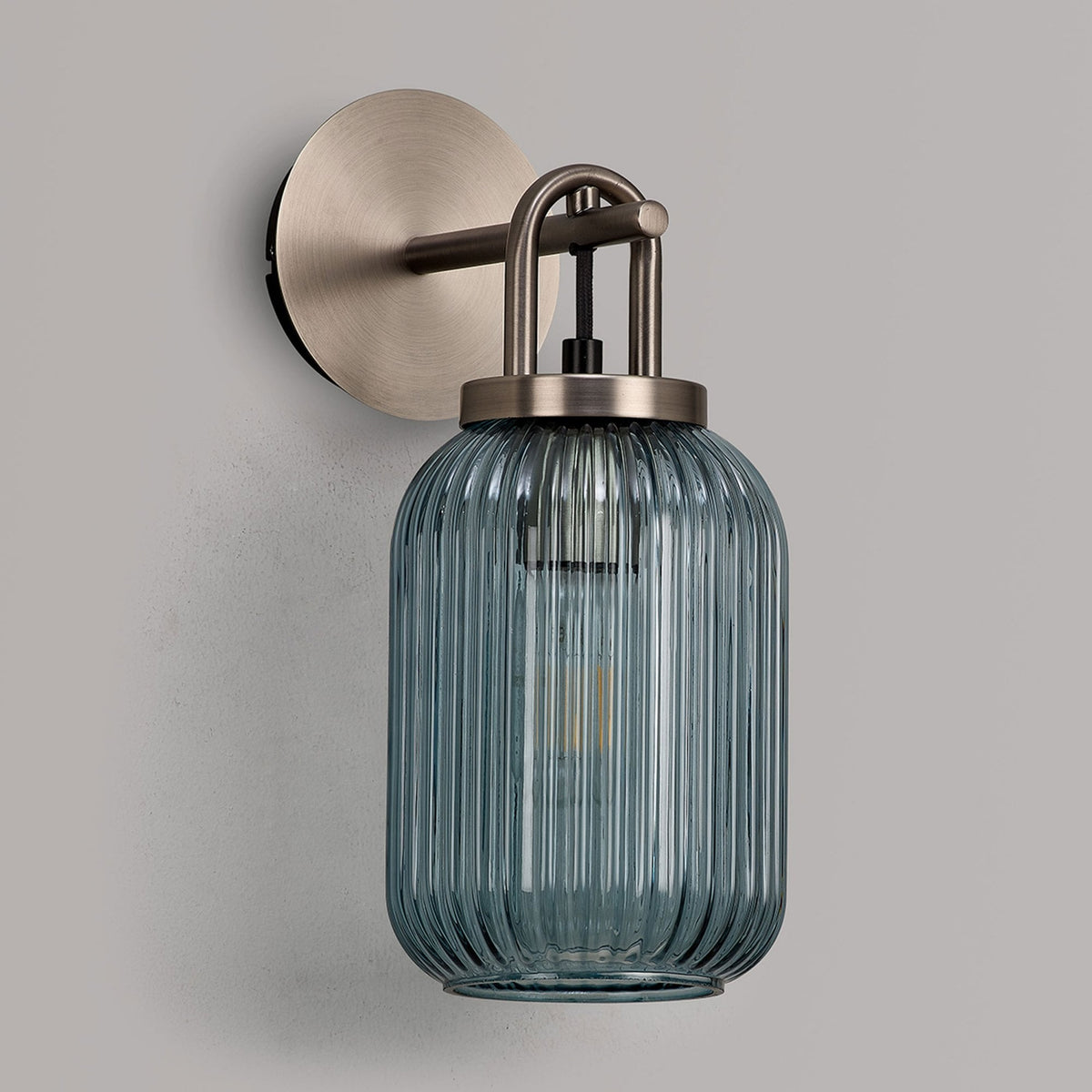 Atherington Wall Light in Antique Silver with Petrol Blue Ribbed Glass Shade
