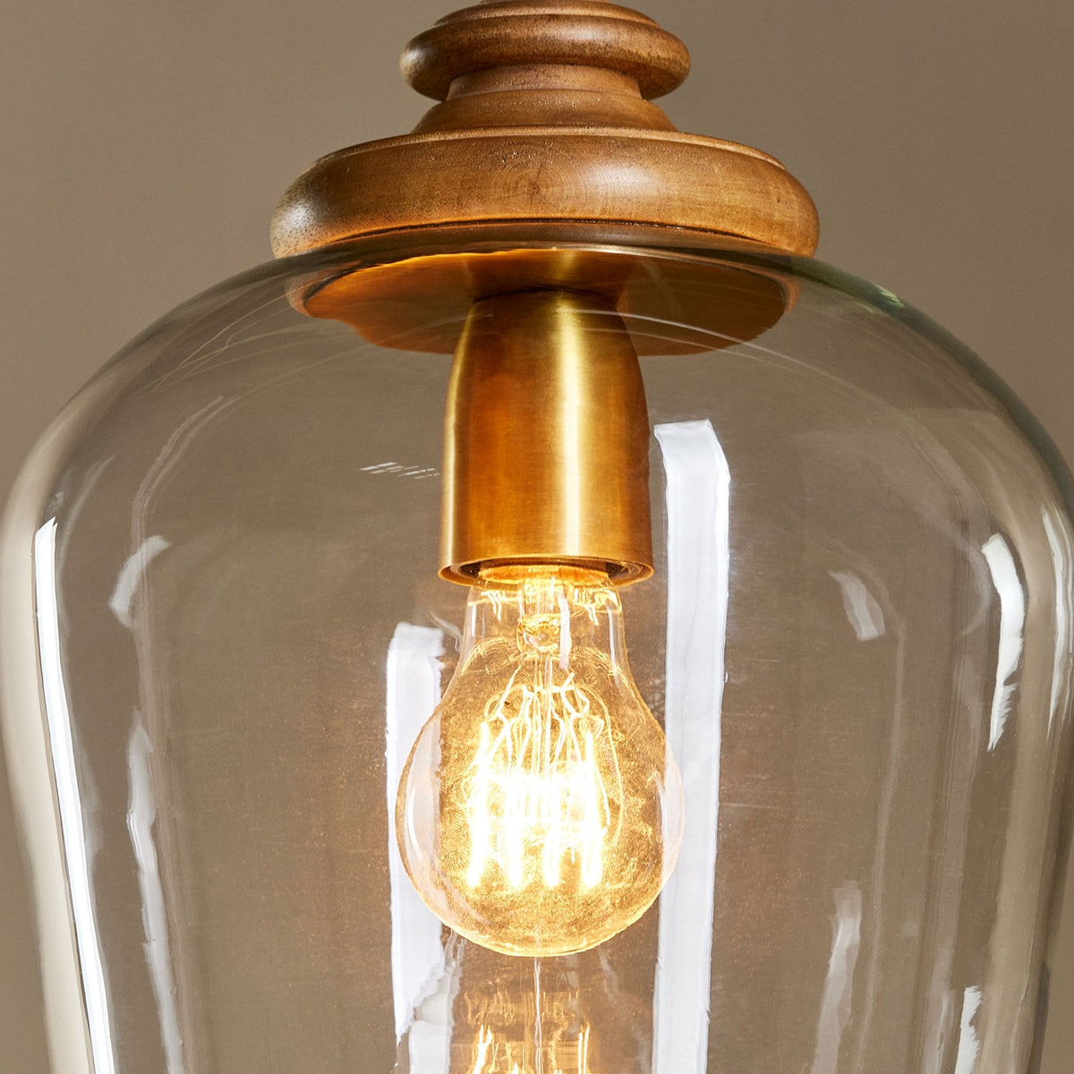 Varuna Single Drop Pendant in Natural Mango Wood with Clear Glass Shade