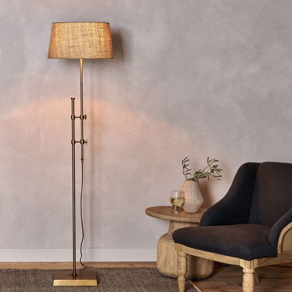 Chintala Adjustable Height Iron Floor Lamp In Antique Brass