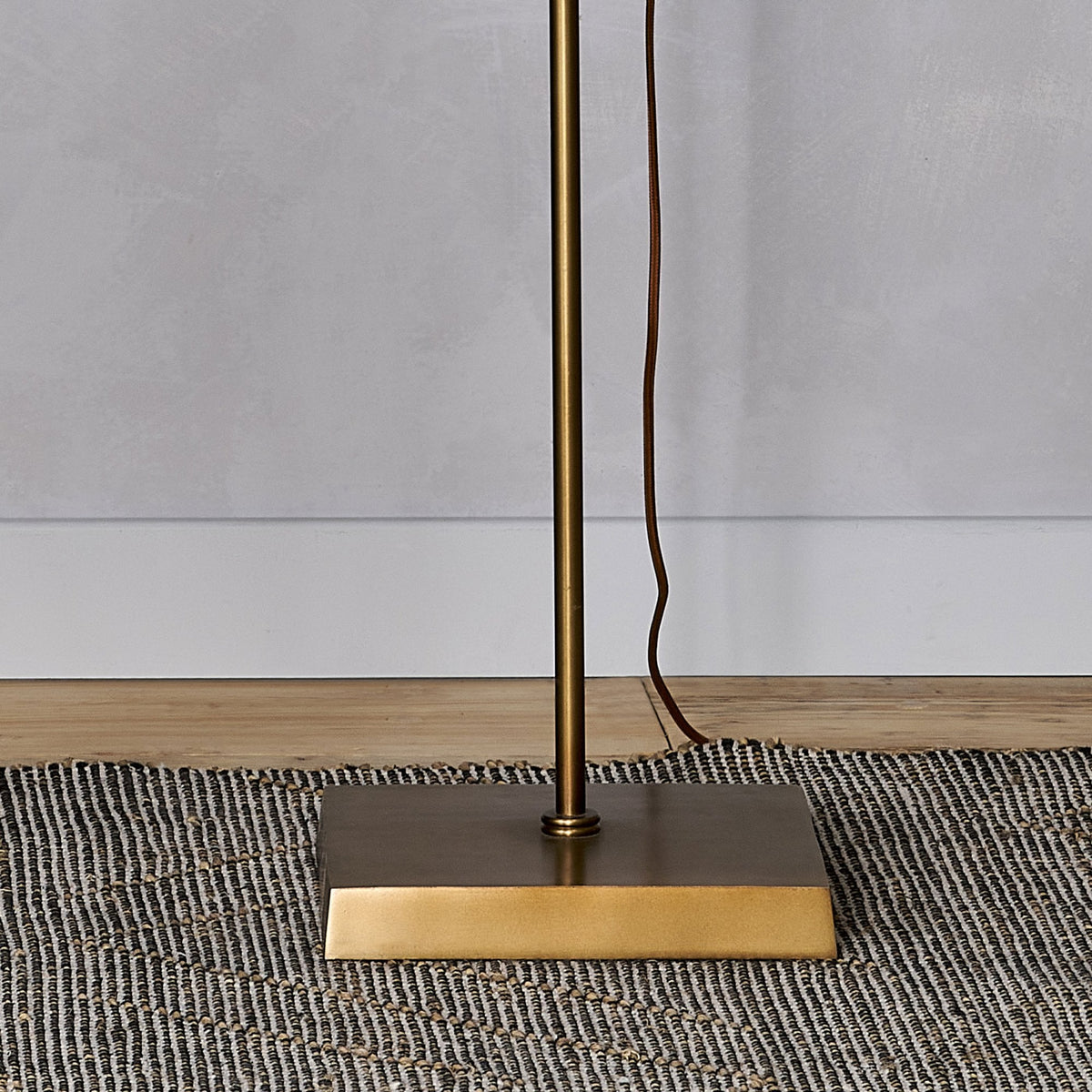 Chintala Adjustable Height Iron Floor Lamp In Antique Brass