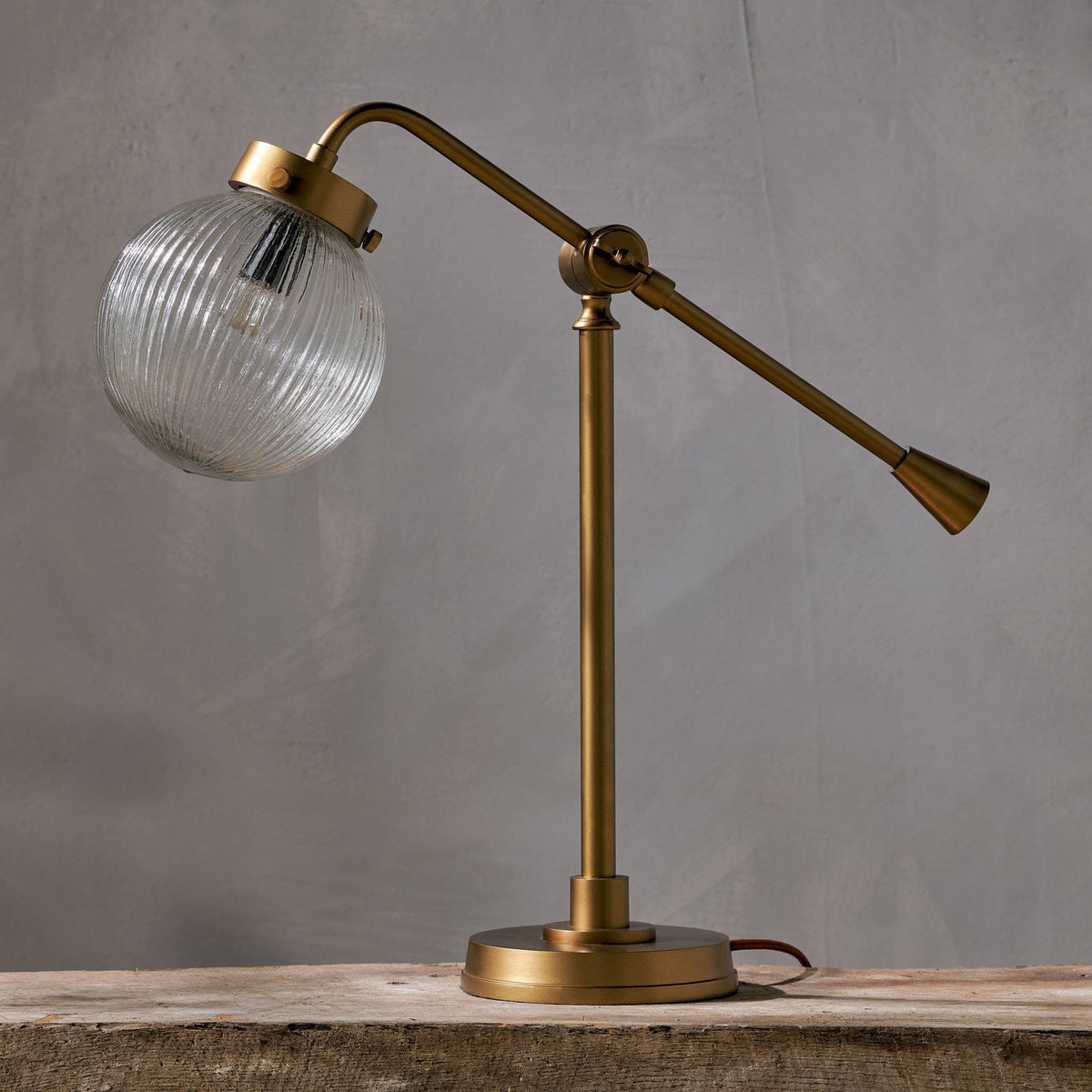Sengol Adjustable Desk Lamp in Antique Brass with Recycled Glass Diffuser