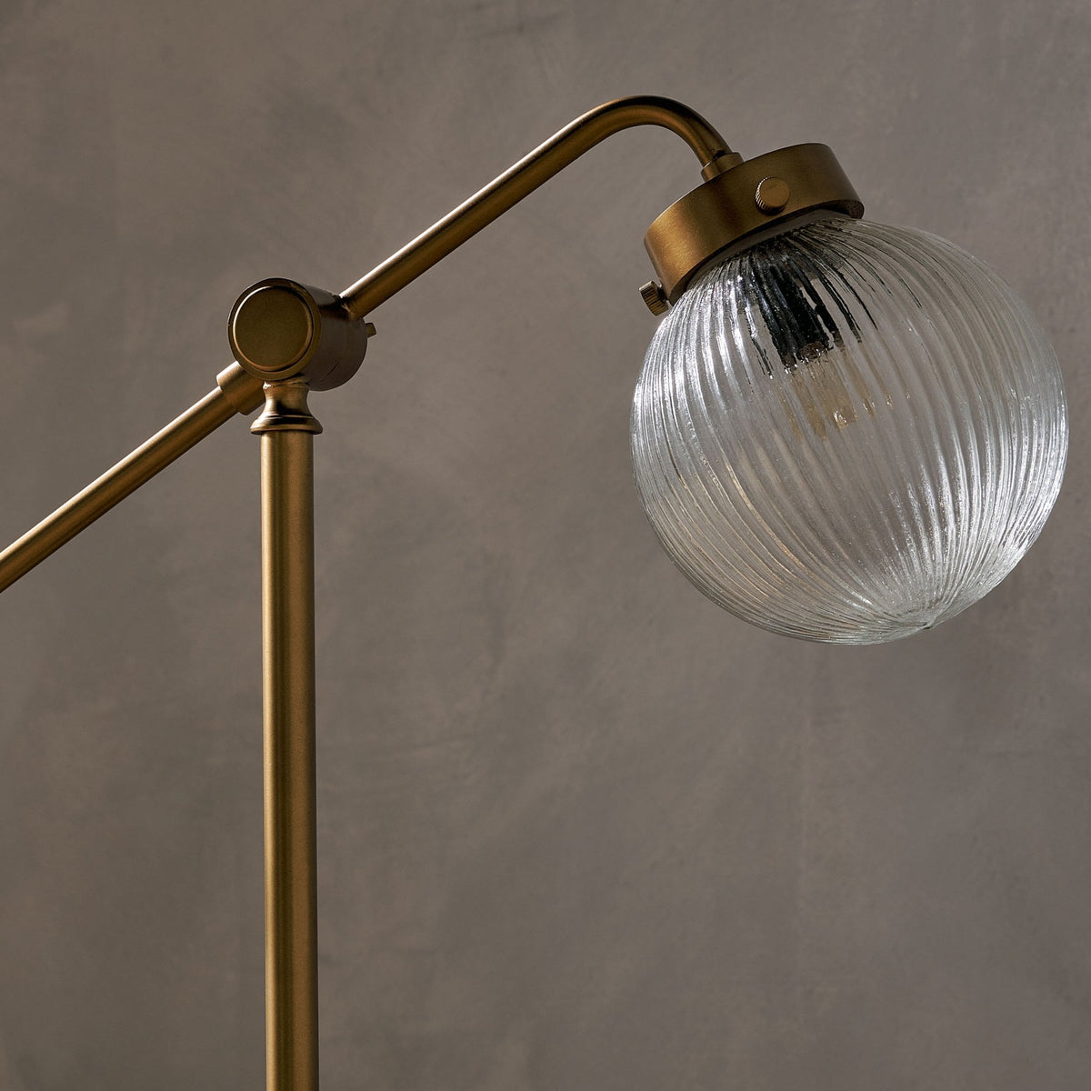 Sengol Adjustable Desk Lamp in Antique Brass with Recycled Glass Diffuser