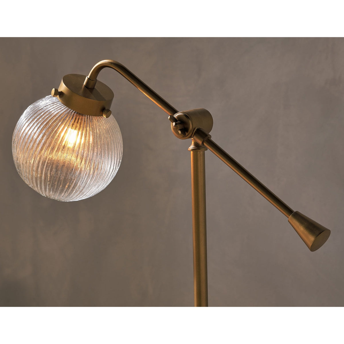 Sengol Adjustable Desk Lamp in Antique Brass with Recycled Glass Diffuser