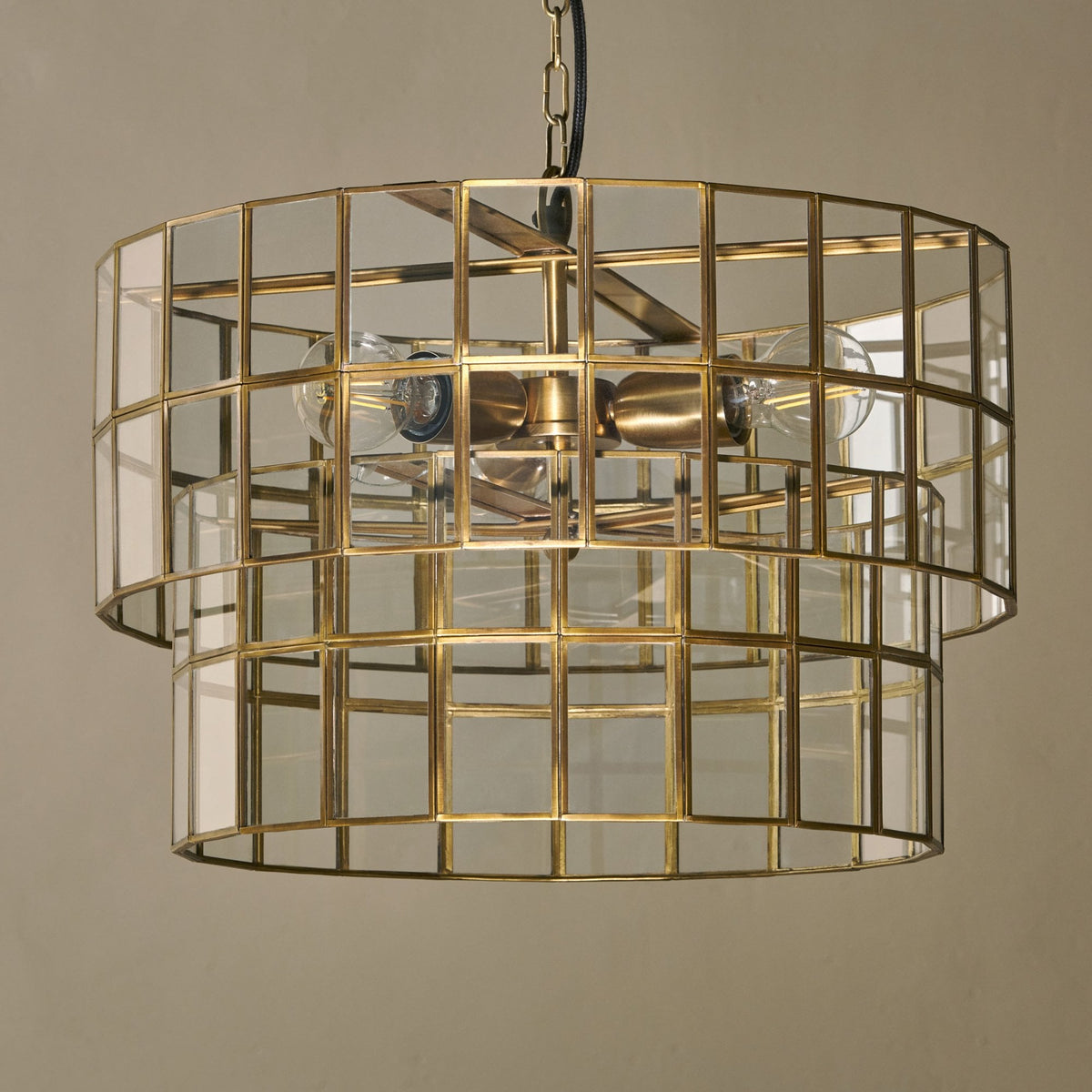 Kirindi Clear Glass Panelled Chandelier in Antique Brass